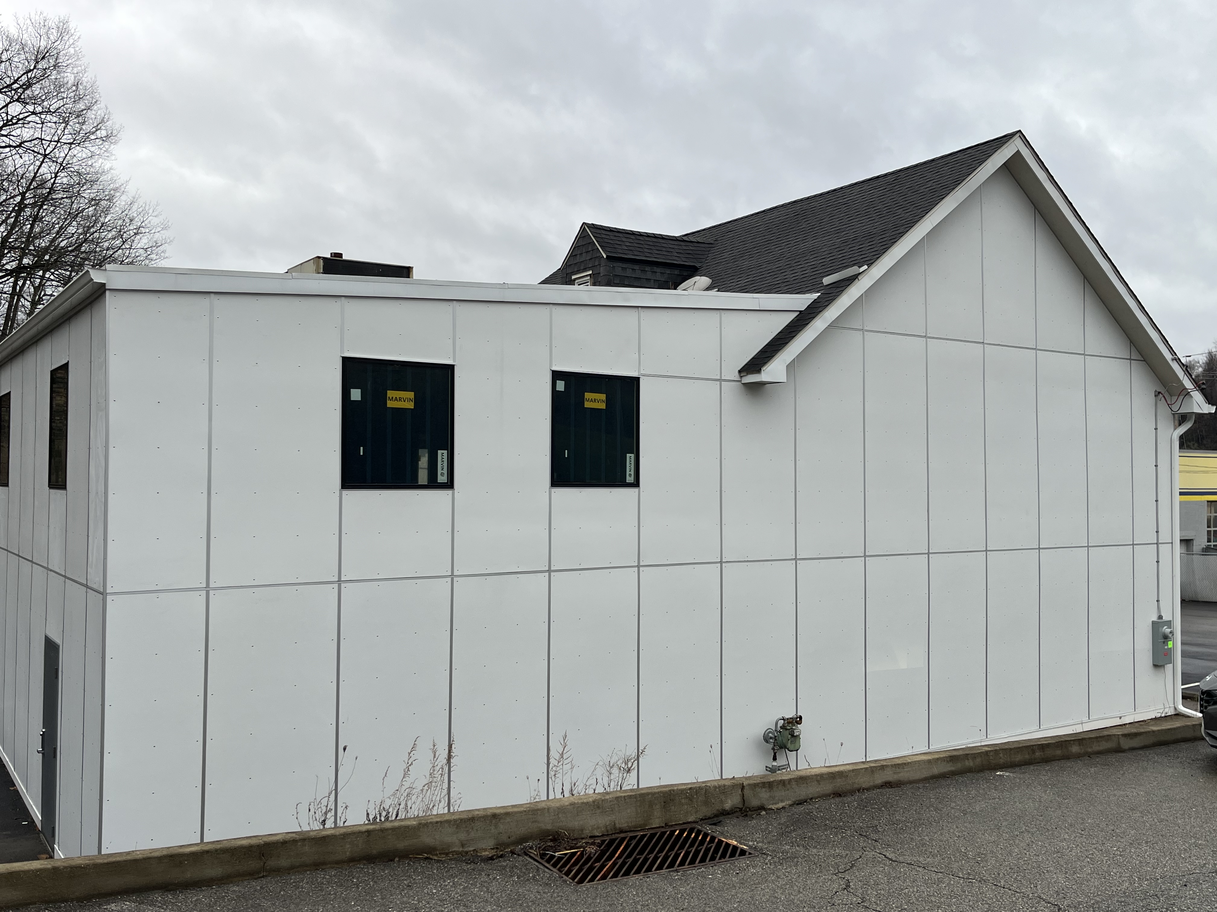 Completed building addition with Hardie panel siding