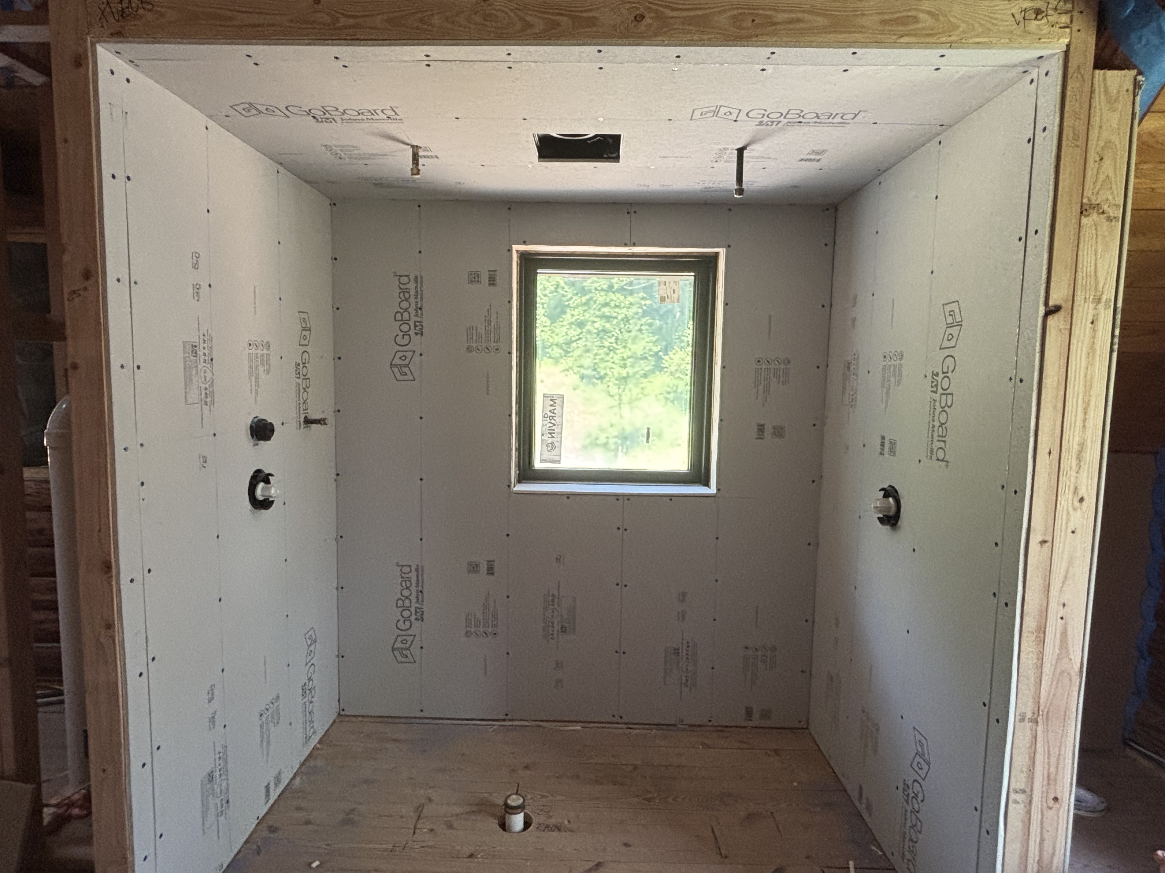 Framed room with window and GoBoard walls