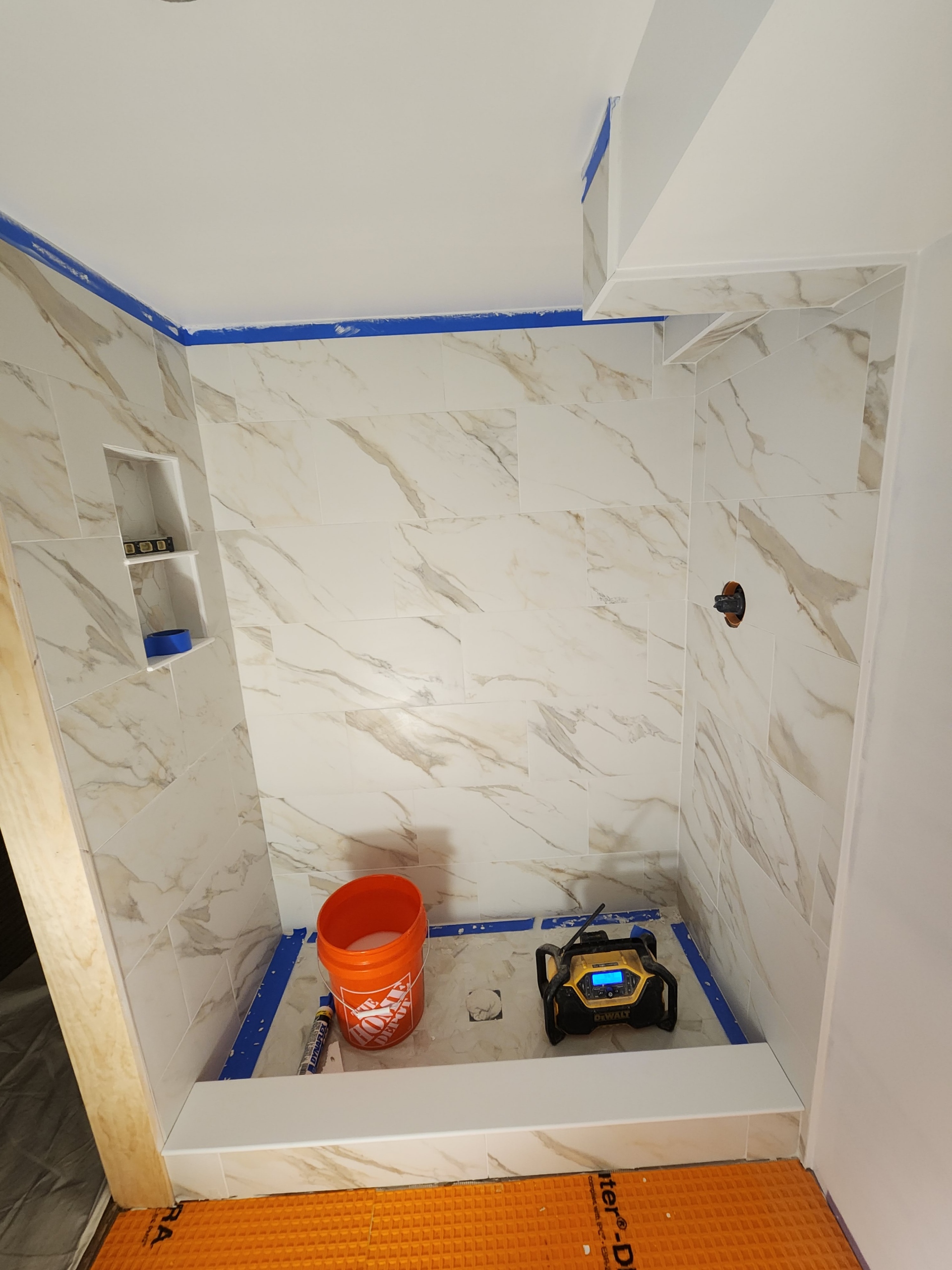 Calacatta gold marble shower